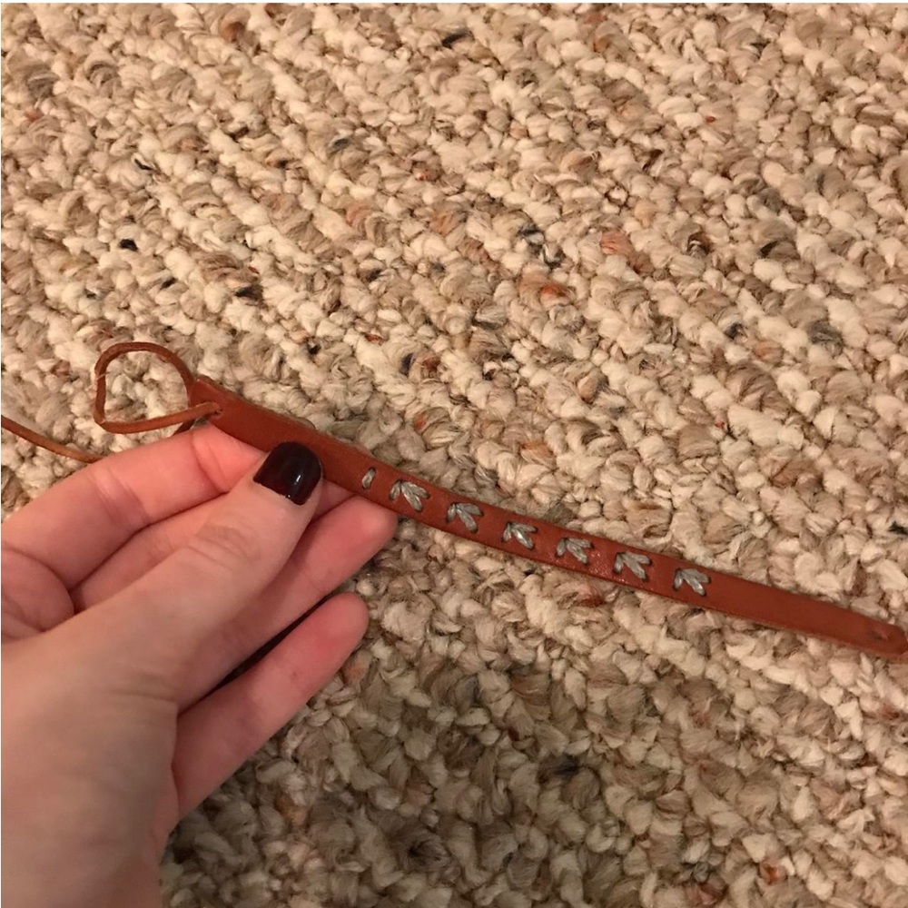 Leather tie bracelet with blue detailing
